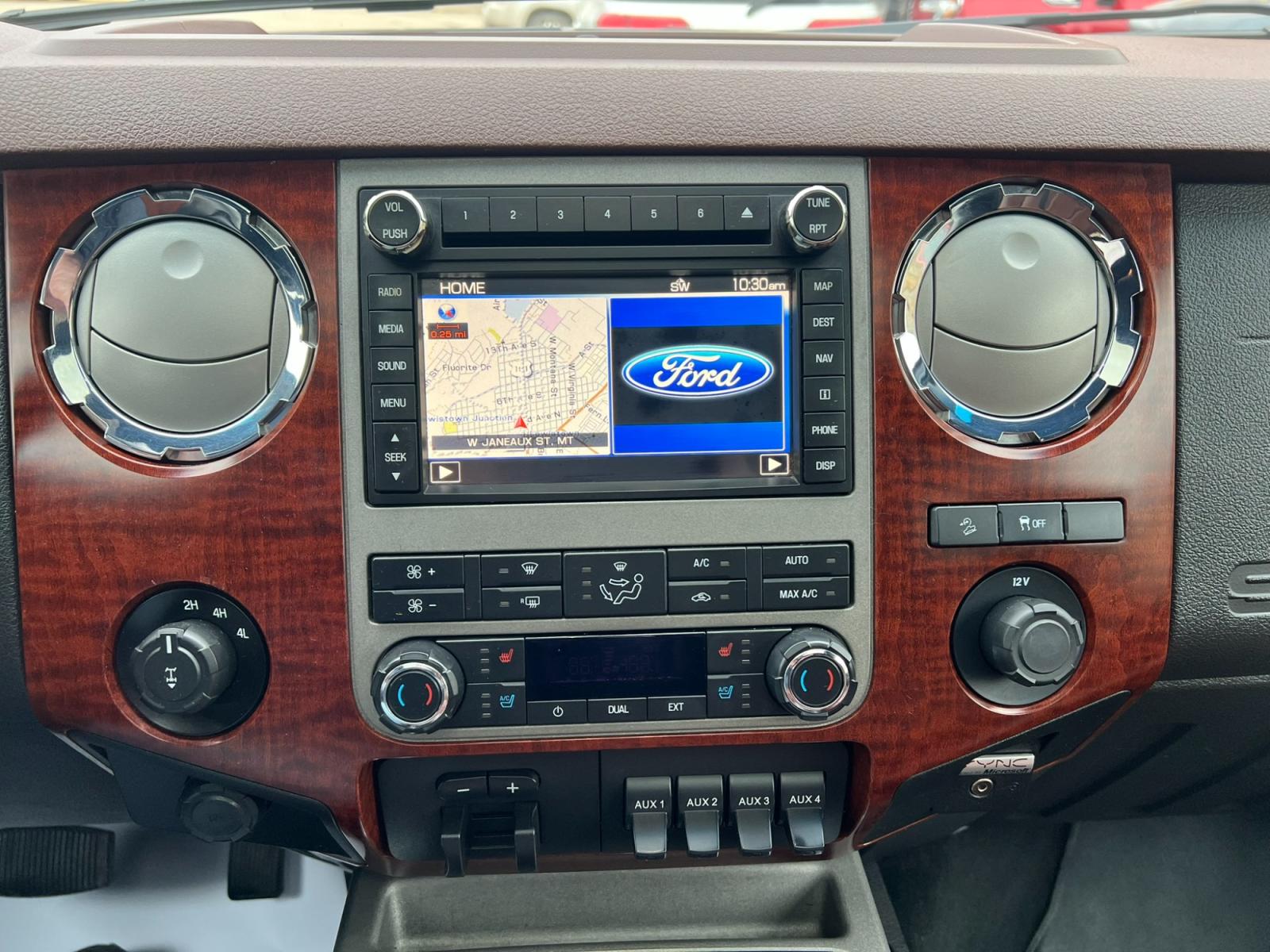2012 Maroon /Brown Ford F-350 SD King Ranch (1FT8W3BT7CE) with an 6.7L V8 F OHV 32V DIESEL engine, Automatic transmission, located at 116 5th Avenue South, Lewistown, MT, 59457, 47.063877, -109.427879 - Introducing the ultimate combination of power and luxury – the 2012 Ford F350 Crew Cab King Ranch 4x4. With its robust Powerstroke diesel engine, this truck is built to handle anything you throw at it. Whether you're towing a trailer or cruising around town, the F350 delivers top-notch performance - Photo #17